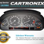 Instrument cluster for BMW E39 5 Series with speedometer, tachometer, and warning lights.